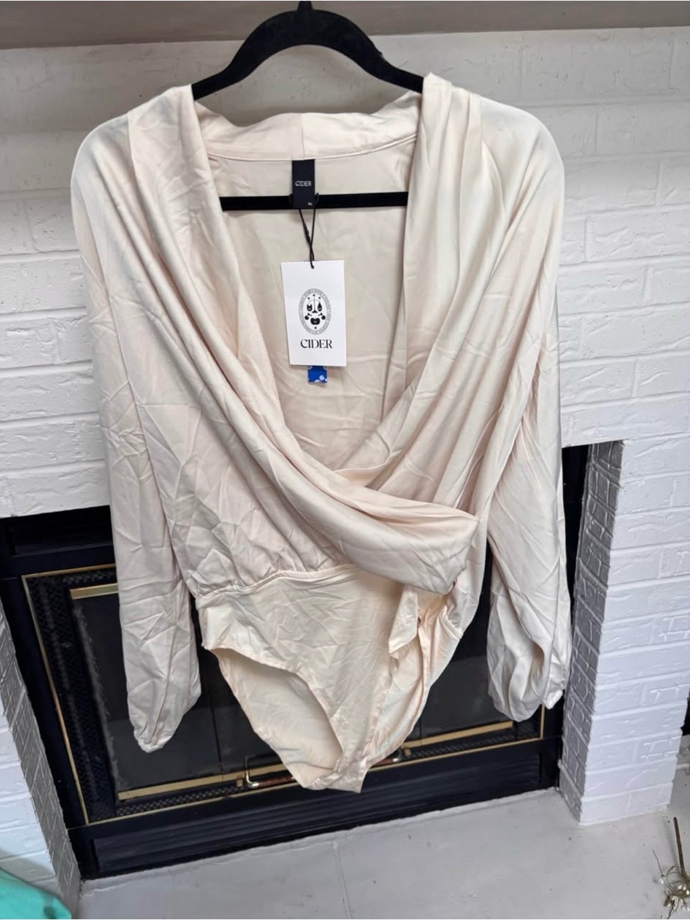Cider Draped Cream Long-Sleeve Bodysuit
